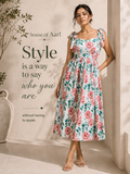 Feminine, padded floral midi dress with flared silhouette.